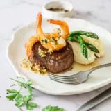 Surf and Turf served with Asparagus  on Mashed Potatoes